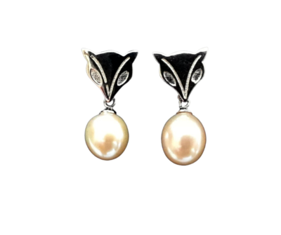 The pearl drop earrings- AAA genuine Freshwater pearls with a .925 silver post.