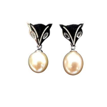 The pearl drop earrings- AAA genuine Freshwater pearls with a .925 silver post.